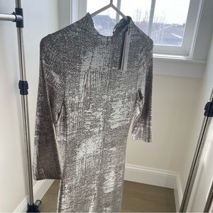 This dress is a size small by Alice + Olivia